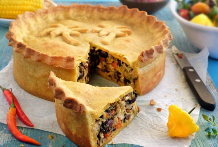 Short crust pastry pie with piece taken out