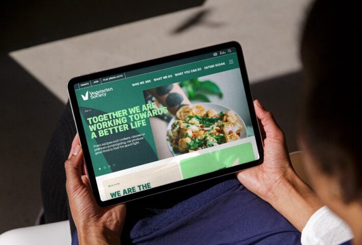 someone looking at website on tablet