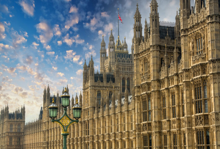 Westminster,Palace,Facade,Against,A,Blue,Sky.