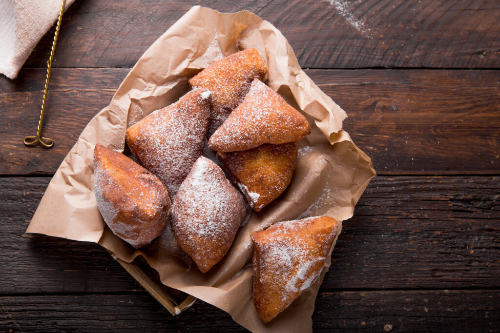 Cardamom Mandazi, a soft fried doughnut popular as a breakfast street food in East Africa, made in the Global Street Food Favourites cookery class.
